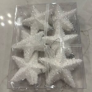Star shaped tinsel ornaments